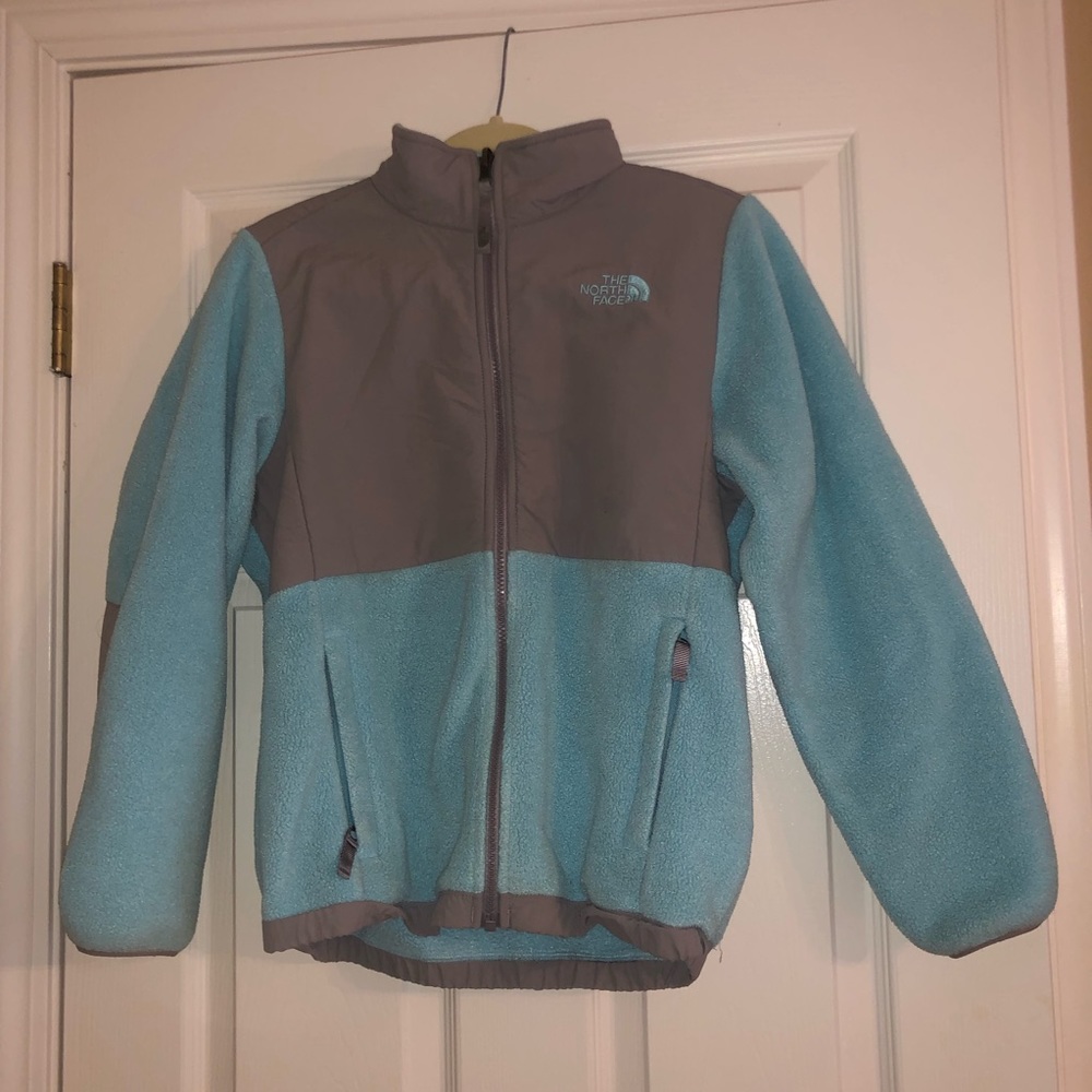 Light blue and gray North Face zip up jacket.